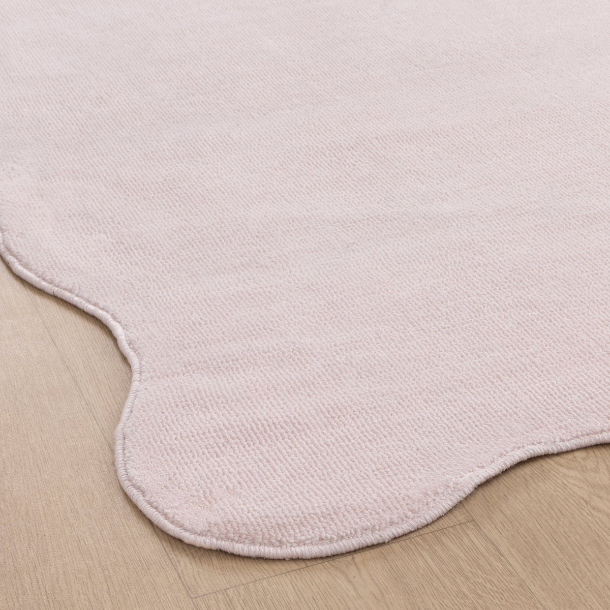 Ollie Scalloped Irregular Rug Pink